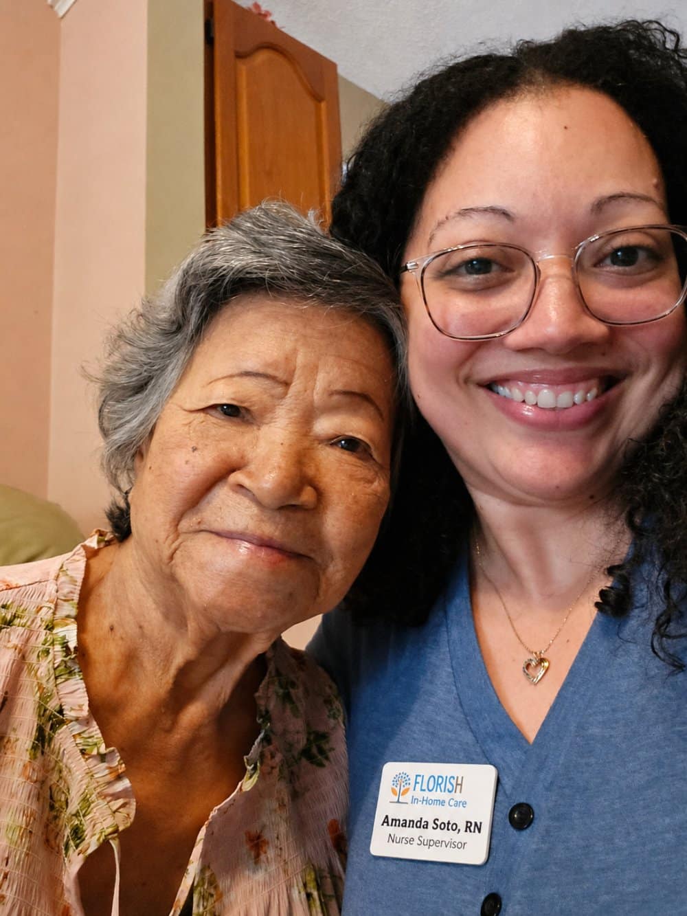 caregiver talking to her patient in wheelchair